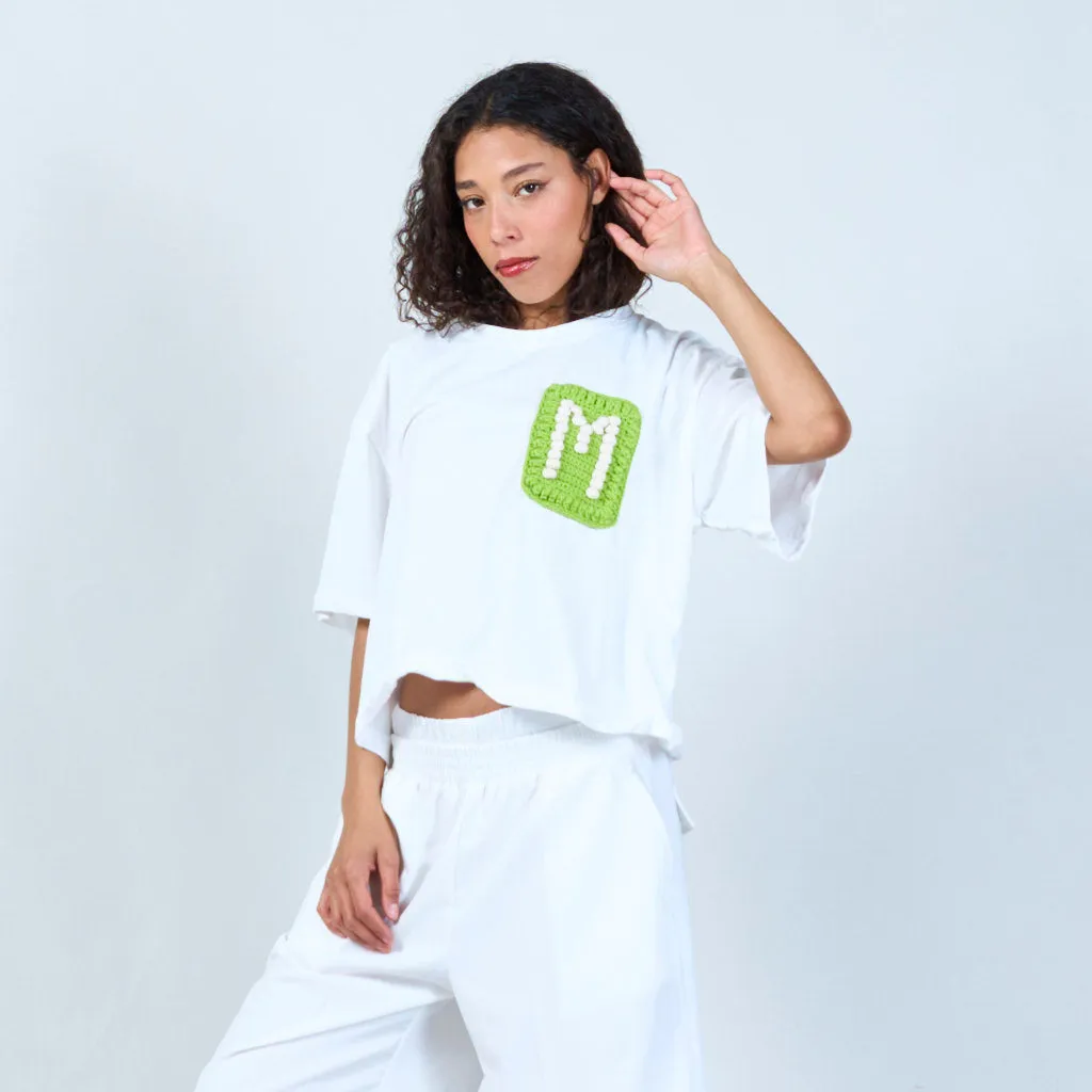 Casual t-shirt with crochet letter "M" patch pocket wholesale