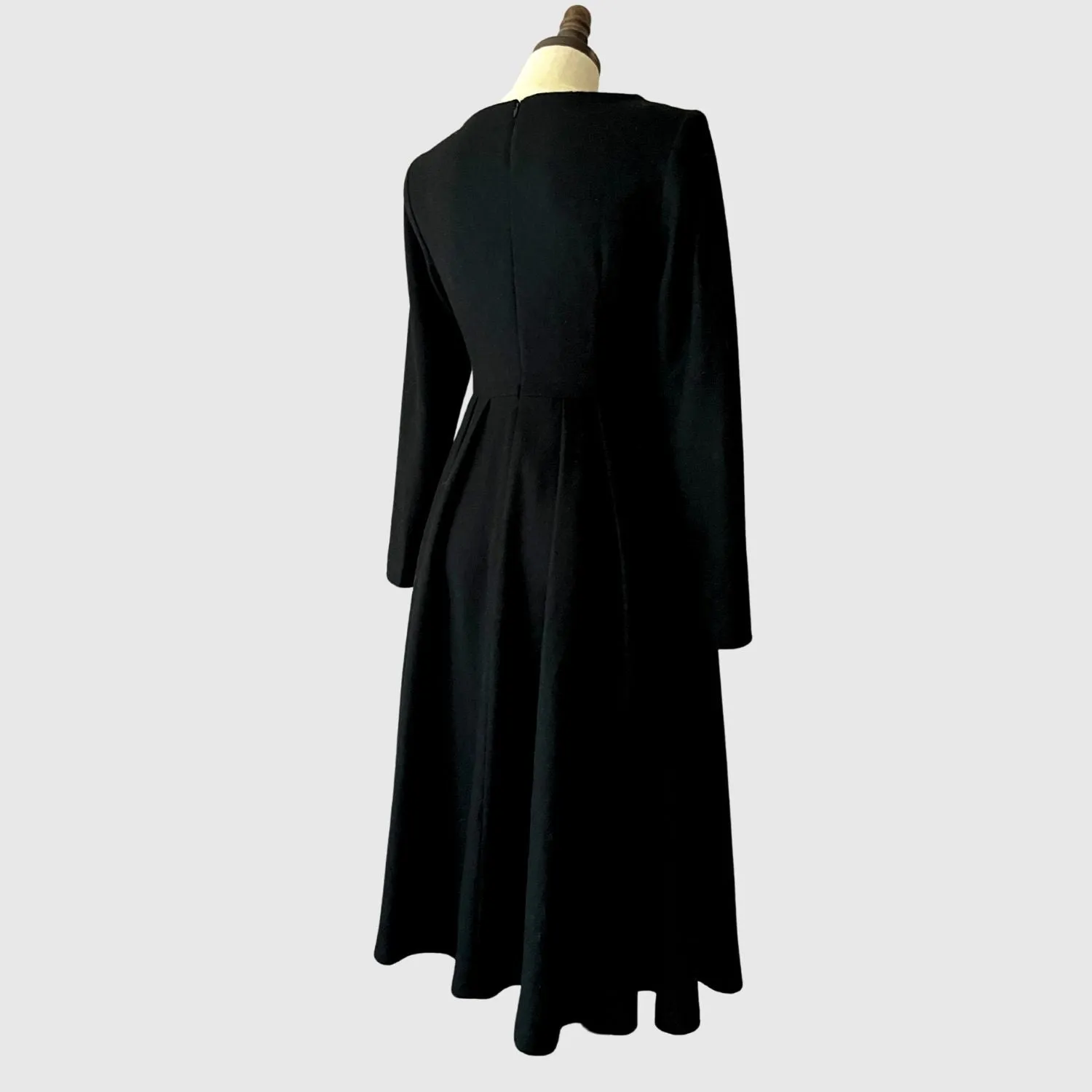 Pleated long wool dress with seam pockets